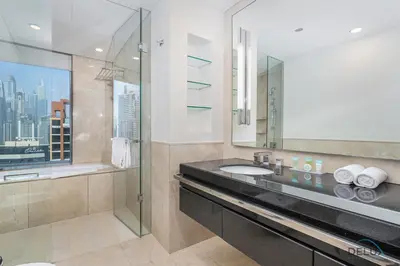 a bathroom with a sink and a mirror at Marina Canal Views from the Balcony, Close to Marina Mall, The Address Residences, Dubai Marina by Deluxe Holiday Homes in Dubai
