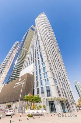 a tall building with a lot of windows at Sea Views from Living to Bedroom Perfect for Staycation, Dubai Marina by Deluxe Holiday Homes in Dubai