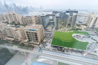 an aerial view of a city with tall buildings at Palm Tower where Luxury & View meet in one place in Dubai