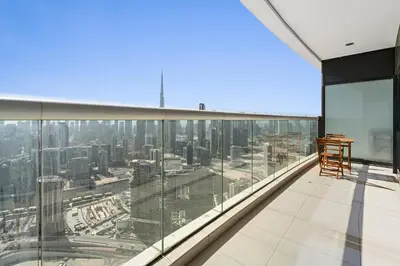 a balcony with a view of a city at ALiving Elegant 1BR I Burj Khalifa View I Paramount Towers- 6103 in Dubai