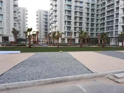 a park with palm trees and tall buildings at DUBAI - Glitz 3 Residences - MAJESTIC Luxe Holiday Home - 2BR - Sleep 4 - FOR FAMILIES & COUPLES STAYS ONLY in Dubai