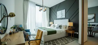 a bedroom with a bed and a large window at Jumeirah Gate Tower 1 - Stylish Apartment with Pool & City Views By ĀYA Boutique in Dubai