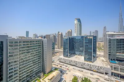 an aerial view of a city with tall buildings at Distinguished 1BR at Vera Tower Business Bay by Deluxe Holiday Homes in Dubai