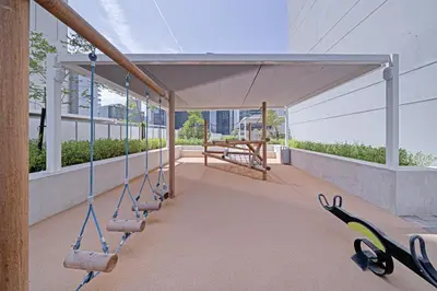 a swinging area on the roof of a building at Alluring 1 BD Apartment in Business Bay with Burj Khalifa view in Dubai