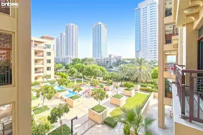 a view of a park in a city with tall buildings at bnbmehomes - Túria Tower A in Dubai