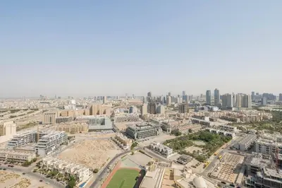 an aerial view of a city with tall buildings at High floor 1BR vacation home with terrace in Dubai