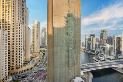 a view of a city with a bridge and buildings at Stunning Space with Full Marina View in Dubai