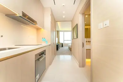 a kitchen with a sink and a stove at FAM Living - Palm Tower - Palm Jumeirah - Panoramic Studios in Dubai