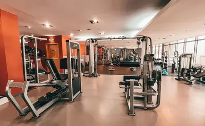 a gym with lots of treadmills and machines at Elite Royal Apartment - Panoramic Full Burj Khalifa, Fountain & Skyline view - Baron in Dubai