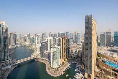 an aerial view of a city with a river and buildings at Frank Porter - Bay Central Tower 1 in Dubai