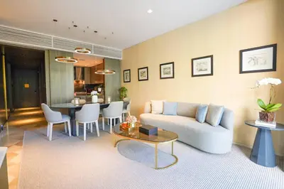 a living room with a couch and a table at Private Pool Apt. Five Palm Jumeirah up to 6guest in Dubai