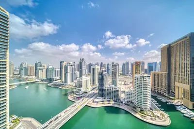 a view of a city with a river and buildings at Amazing Marina View - Near the Beach! in Dubai