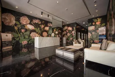 a dressing room with a flower mural on the wall at BR Luxe 1 BDR Apartment w/ Balcony & Sea Views in Dubai