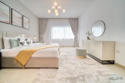 a bedroom with a large bed and a mirror at Opulent 1BR at MAG 218 Dubai Marina by Deluxe Holiday Homes in Dubai