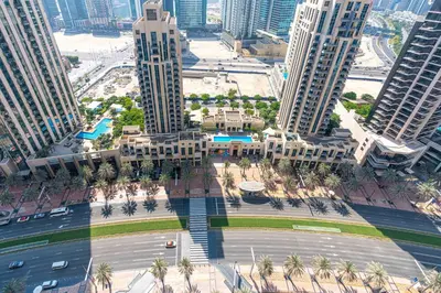 an aerial view of a city with tall buildings at Lux BnB I 29 Burj BLVD I Downtown Views in Dubai