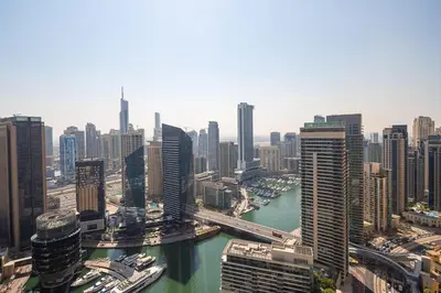an aerial view of a city with a river and buildings at Frank Porter - Bay Central West 2 in Dubai
