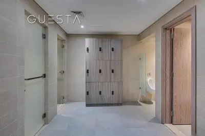 a walk in shower in a dressing room at LIV Residence Tower, Dubai Marina in Dubai