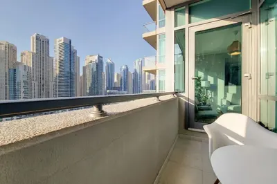 a balcony with a view of a city skyline at Al Majara 2 - Gorgeous One Bedroom in Dubai