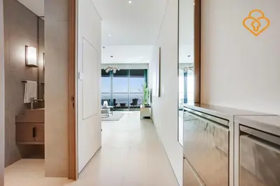 a kitchen with white walls and a white counter top at Keysplease Luxury 1 BR Apt Address W Private Beach, JBR in Dubai