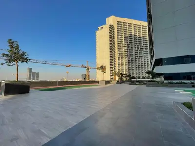 a large plaza in a city with tall buildings at Spectacular Views of Dubai Skyline in Dubai