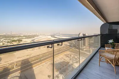 a balcony with a view of the beach at Frank Porter - RP Heights in Dubai
