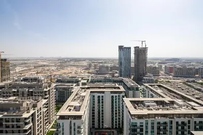 an aerial view of a city with tall buildings at Frank Porter - One Park Avenue in Dubai