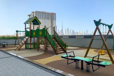 a playground on the roof of a building at Frank Porter - One Park Avenue in Dubai