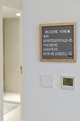 a sign on a wall in a room at Brand New 1BR in Dubai Hills Quiet and Peaceful in Dubai