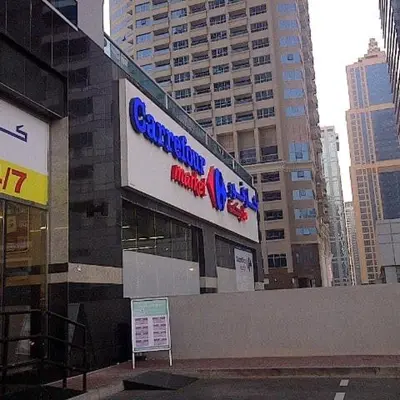 a building with a sign in front of it at Super Elegant studio apartment-Sparkle tower By SWEET HOMES in Dubai