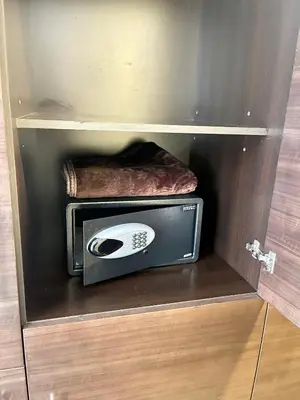 a microwave and a toaster oven in a drawer at Super Elegant studio apartment-Sparkle tower By SWEET HOMES in Dubai