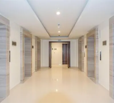 an empty hallway of a building with doors and ceilings at ONYX - Full Burj Khalifa View Dubai 2 BEDROOM APARTMENT - DOWNTOWN DUBAI in Dubai