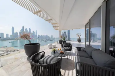a living room with a couch and chairs at EDEN'S Homes & Villas - FIVE Palm Residences Penthouses in Dubai