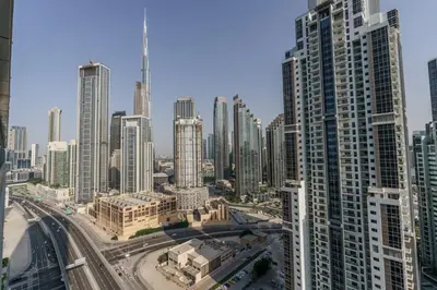 an aerial view of a city with tall buildings at GuestReady - Fabulous 2BR with Burj Khalifa view in Dubai
