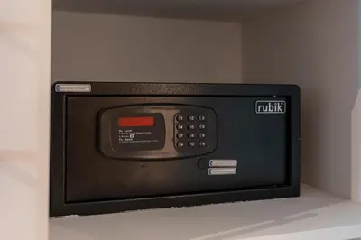 a microwave oven sitting on top of a shelf at Luxury studio in Discovery Gardens near metro in Dubai