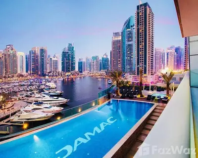 a view of a city skyline with a swimming pool at White Sage - Fendi Apartment With Full Palm Jumeirah View in Dubai