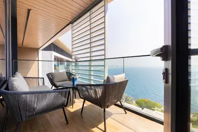a living room with a view of the ocean at Welcome Home - Bluewaters brand new 2-bedroom in Dubai