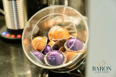a glass container filled with different types of balls at The Timeless in Dubai