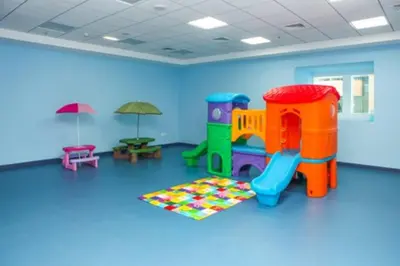 a room with a play room with a play equipment at Dubai Marina Gem - Elite Residences 1BHK Retreat 4501 in Dubai