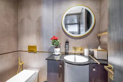 a bathroom with a sink and a mirror at FIVE Palm Jumeirah 2BR Luxury Penthouse, Private Pool, Full Marina Sea View in Dubai