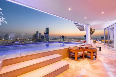 a swimming pool on the roof of a building at FIVE Palm Jumeirah 2BR Luxury Penthouse, Private Pool, Full Marina Sea View in Dubai