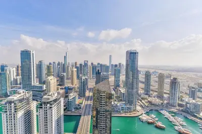 an aerial view of a city with tall buildings at Ultra Luxury JBR Duplex Penthouse - Free 5 star beach access in Dubai