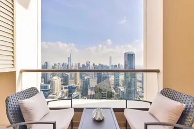 a balcony with a view of a city skyline at Ultra Luxury JBR Duplex Penthouse - Free 5 star beach access in Dubai