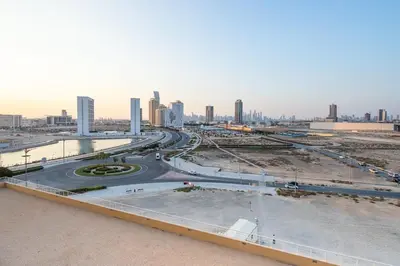 a view of a city with tall buildings and roads at Frank Porter - Lakeside Tower D in Dubai