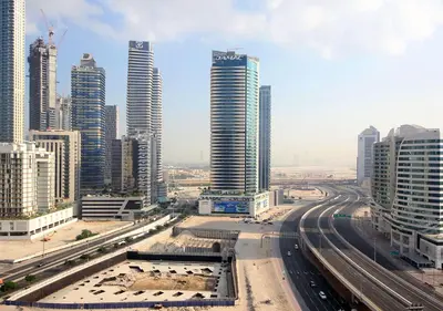 a view of a city with tall buildings at RH- Voguish, Studio in Downtown, short walk to Burj Khalifa in Dubai