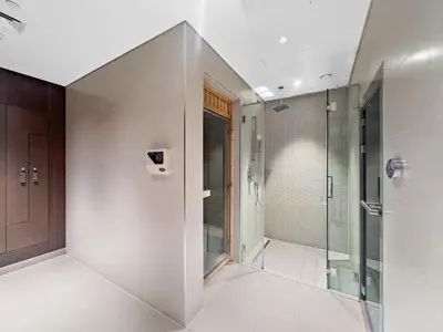 a bathroom with a shower and a walk in shower at New 2 bedroom in Meydan - Burj Khalifa View in Dubai