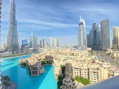 a view of a city with a river and buildings at Durrani Homes - The Residences 5BR Besides Dubai Mall with Burjkhalifa and Fountain view in Dubai