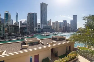 a building with a view of a river and a city at Frank Porter - Al Sahab 2 in Dubai