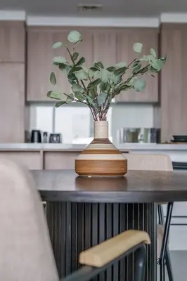a vase sitting on top of a table in a kitchen at GuestReady - Modern Mirza with Marina View in Dubai