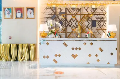 a room with a counter with two lamps on it at Vacay Lettings - Waterfront Studio with great Dubai Canal view in Dubai