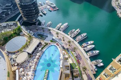 an aerial view of a marina with boats in the water at Ornate 1BR in The Address Residences Dubai Marina by Deluxe Holiday Homes in Dubai
